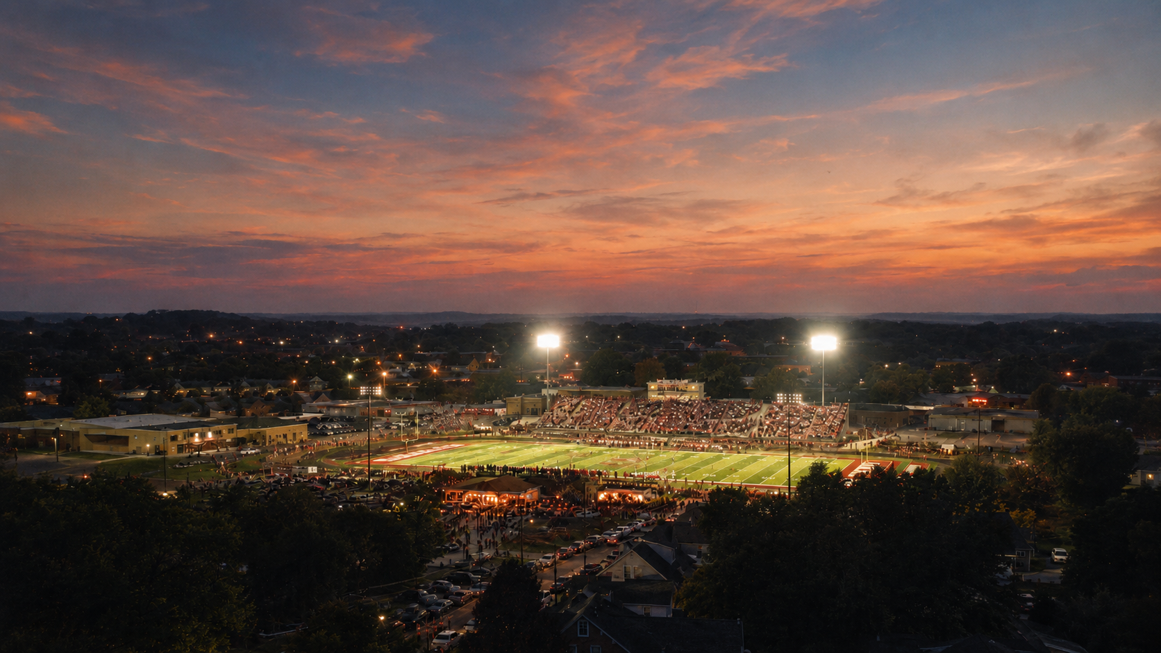 Friday night stadium under stadium lights at sunset
